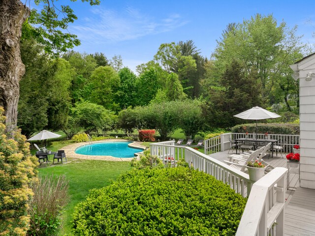 10 Twin Falls Ln, Westport, CT 06880 - swimming pool with outdoor dining space, a yard, and a deck