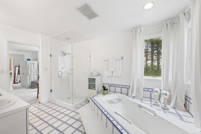 10 Twin Falls Ln, Westport, CT 06880 - bathroom featuring a stall shower, a bath, vanity, and recessed lighting