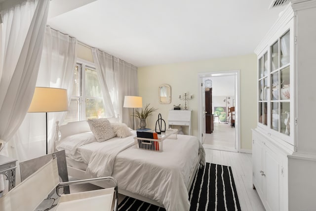 10 Twin Falls Ln, Westport, CT 06880 - bedroom with light wood-style flooring and baseboards
