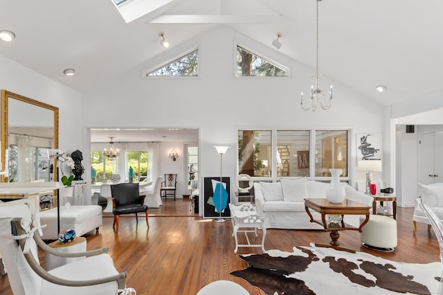 10 Twin Falls Ln, Westport, CT 06880 - living area featuring a chandelier, high vaulted ceiling, wood finished floors, a skylight, and beamed ceiling