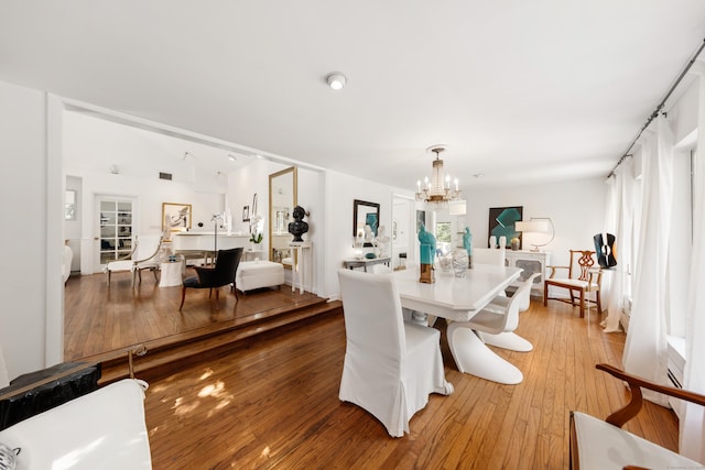 10 Twin Falls Ln, Westport, CT 06880 - dining room featuring a chandelier and light wood finished floors