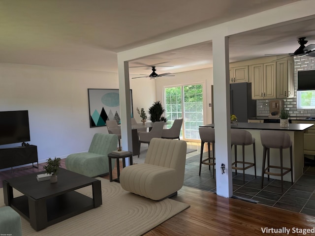 132 Walkley Dr, Southington, CT 06489 - living area with ceiling fan, plenty of natural light, and dark wood-style flooring