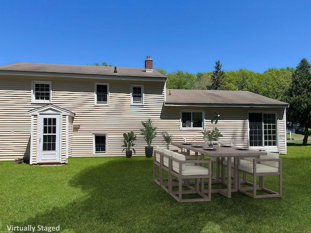 132 Walkley Dr, Southington, CT 06489 - back of house with a chimney and a lawn