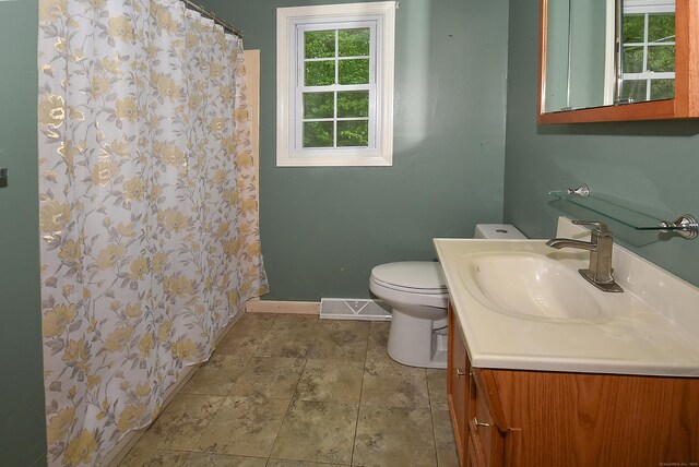 132 Walkley Dr, Southington, CT 06489 - full bath with vanity, toilet, baseboards, and a shower with curtain