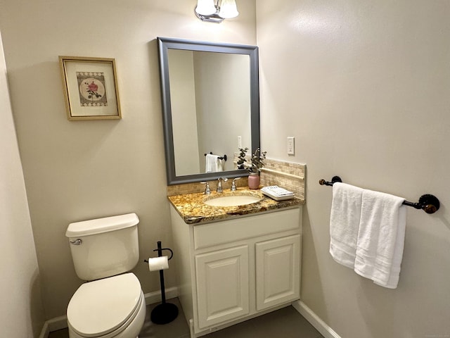 39 Farmstead Ln, Suffield, CT 06078 - half bathroom featuring vanity, toilet, and baseboards