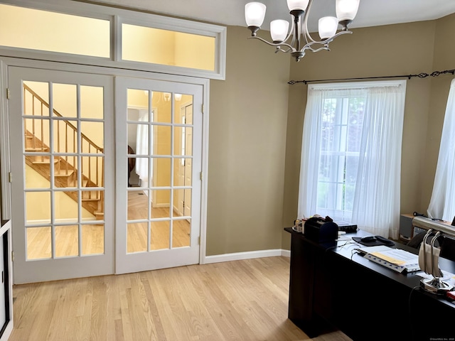 39 Farmstead Ln, Suffield, CT 06078 - office area with a chandelier, light wood finished floors, and baseboards