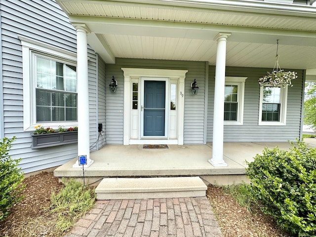 39 Farmstead Ln, Suffield, CT 06078 - entrance to property with a porch