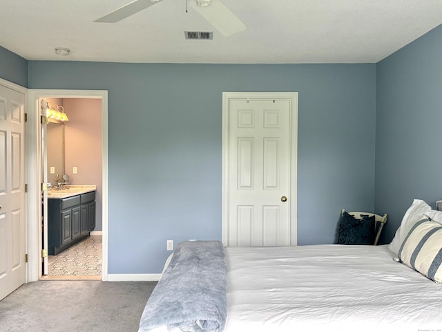 39 Farmstead Ln, Suffield, CT 06078 - bedroom with carpet floors, ensuite bathroom, a sink, baseboards, and ceiling fan