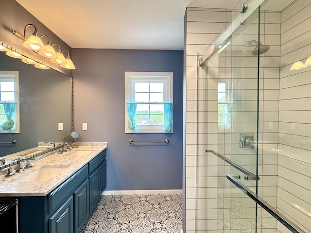 39 Farmstead Ln, Suffield, CT 06078 - full bath with double vanity, healthy amount of natural light, a stall shower, and baseboards