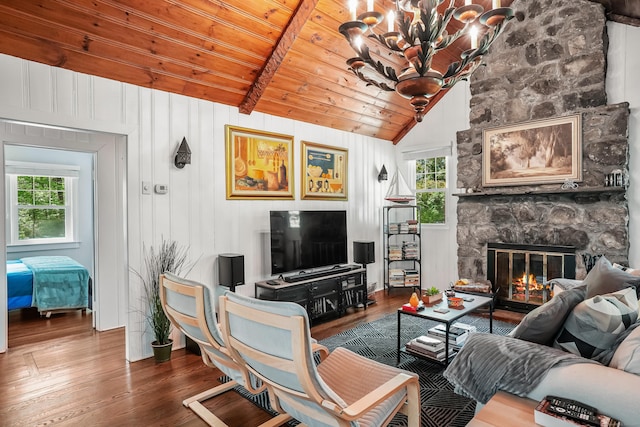 12 Woody Pl, Ridgefield, CT 06877 - living area featuring a chandelier, wood finished floors, wooden ceiling, and a fireplace
