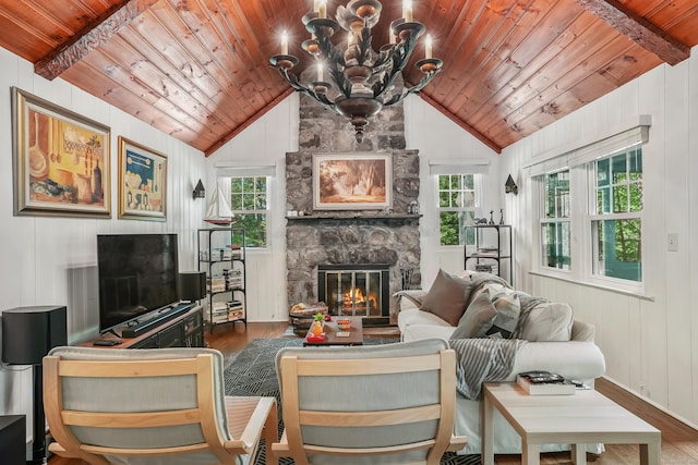 12 Woody Pl, Ridgefield, CT 06877 - living room with wood finished floors, wooden ceiling, vaulted ceiling, a fireplace, and a chandelier