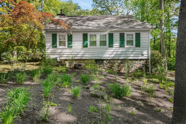 12 Woody Pl, Ridgefield, CT 06877 - view of front of property with a chimney and a shingled roof