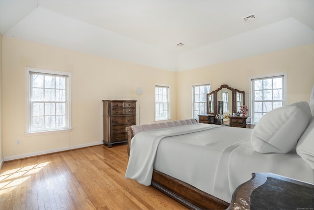 7 Brighton Ln, Simsbury, CT 06070 - bedroom featuring baseboards, multiple windows, light wood-style flooring, and visible vents