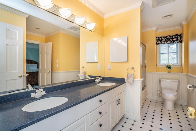 7 Brighton Ln, Simsbury, CT 06070 - full bathroom featuring a wainscoted wall, toilet, visible vents, and a sink
