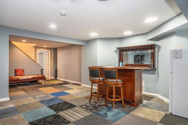 7 Brighton Ln, Simsbury, CT 06070 - bar featuring freestanding refrigerator, recessed lighting, baseboards, and bar area