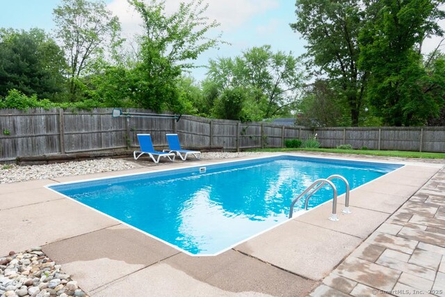 86 Rustic Ln, East Hartford, CT 06118 - view of pool featuring a patio area and a fenced backyard
