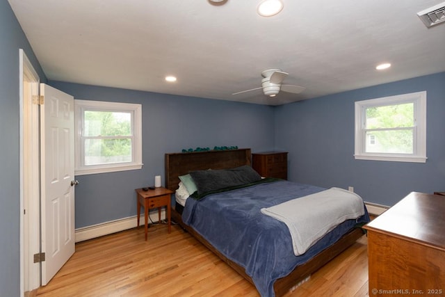 86 Rustic Ln, East Hartford, CT 06118 - bedroom featuring a baseboard radiator, light wood-type flooring, recessed lighting, baseboards, and a ceiling fan