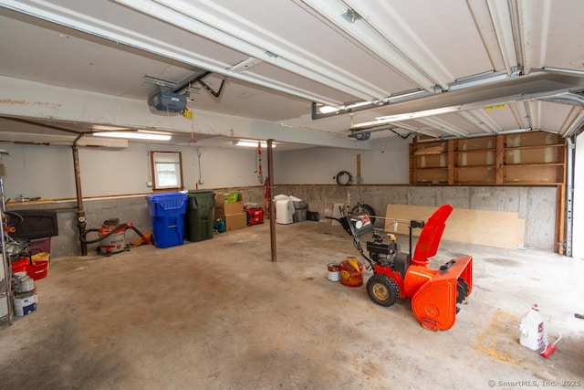86 Rustic Ln, East Hartford, CT 06118 - garage featuring a garage door opener