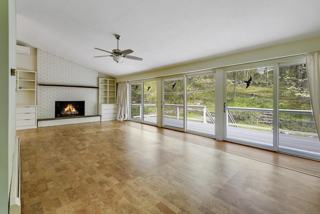 102 Colonial Rd, Guilford, CT 06437 - unfurnished living room featuring plenty of natural light, lofted ceiling, a wall unit AC, ceiling fan, and a fireplace