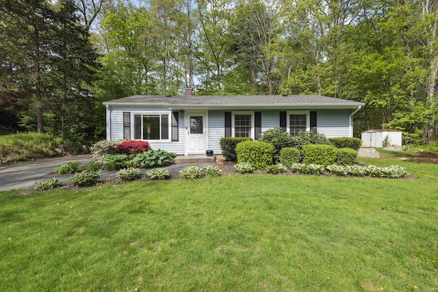 451 Cow Hill Rd, Groton, CT 06355 - ranch-style home with a front yard and a chimney