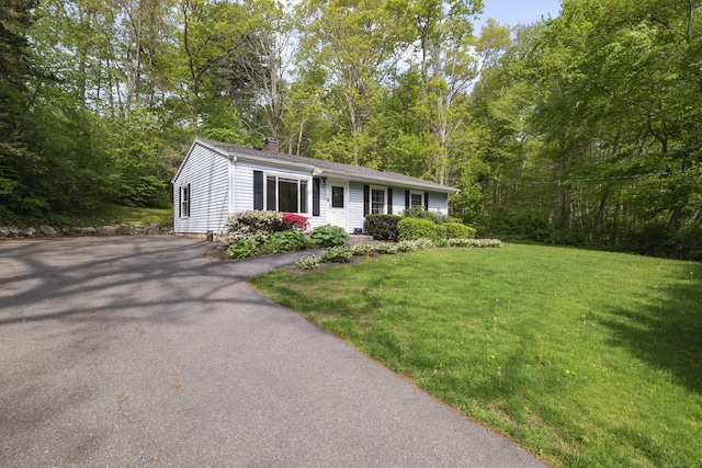 451 Cow Hill Rd, Groton, CT 06355 - single story home featuring a chimney, a front yard, and driveway
