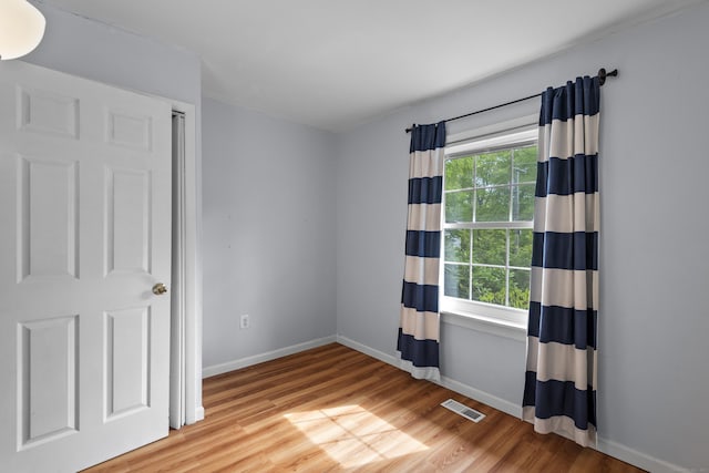 451 Cow Hill Rd, Groton, CT 06355 - unfurnished room featuring wood finished floors and baseboards