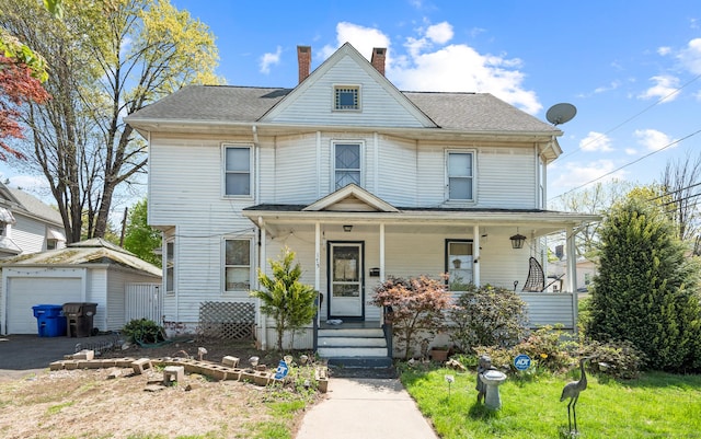 175 Lincoln St, Middletown, CT 06457 - victorian home with a detached garage, an outdoor structure, a chimney, and a porch