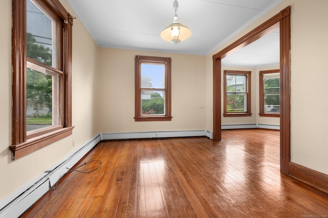 175 Lincoln St, Middletown, CT 06457 - empty room with ornamental molding, a baseboard heating unit, hardwood / wood-style flooring, and baseboards