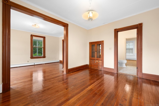 175 Lincoln St, Middletown, CT 06457 - empty room with a baseboard heating unit, hardwood / wood-style flooring, ornamental molding, and baseboards