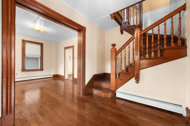 175 Lincoln St, Middletown, CT 06457 - stairs with a baseboard radiator, hardwood / wood-style floors, ornamental molding, and baseboards