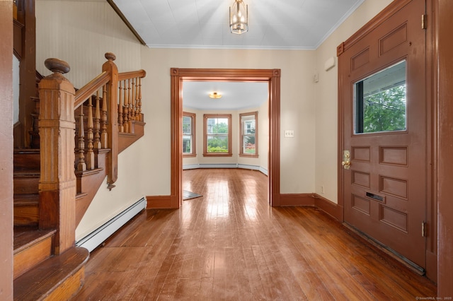 175 Lincoln St, Middletown, CT 06457 - entrance foyer with baseboard heating, ornamental molding, stairs, hardwood / wood-style floors, and plenty of natural light
