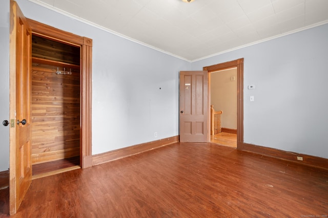 175 Lincoln St, Middletown, CT 06457 - unfurnished bedroom with ornamental molding, wood finished floors, and baseboards