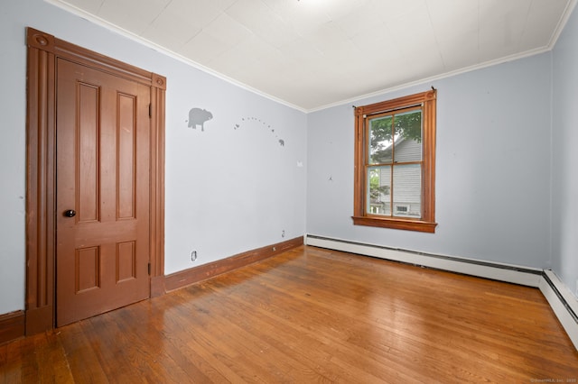 175 Lincoln St, Middletown, CT 06457 - unfurnished room with wood-type flooring, ornamental molding, baseboard heating, and baseboards
