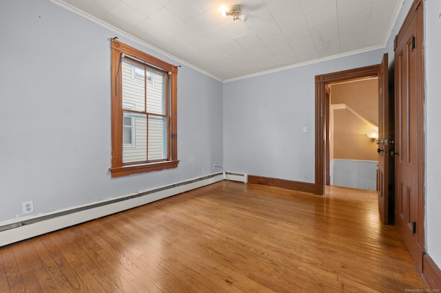 175 Lincoln St, Middletown, CT 06457 - spare room featuring light wood-type flooring, ornamental molding, and baseboard heating