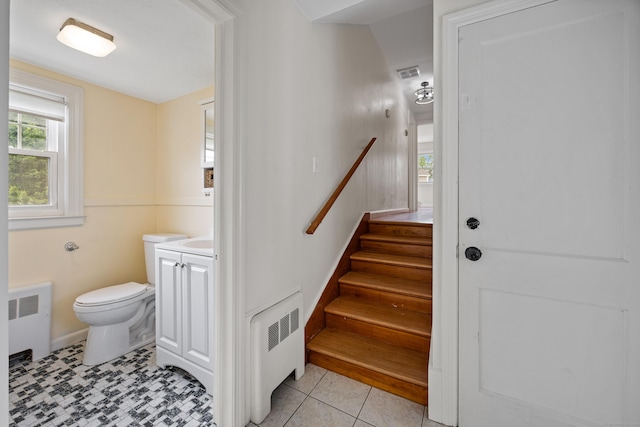 81 Summit St, Southington, CT 06489 - stairs with radiator heating unit
