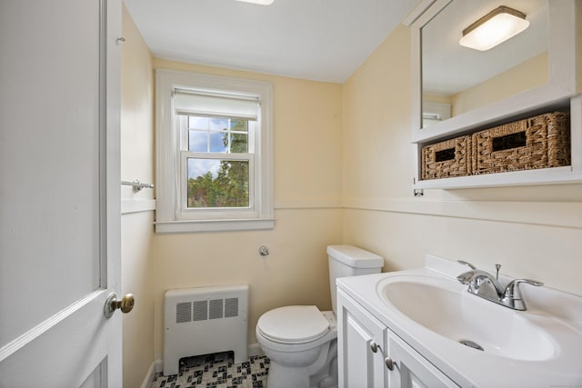 81 Summit St, Southington, CT 06489 - bathroom featuring radiator, toilet, vanity, and baseboards