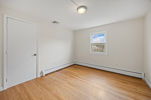 81 Summit St, Southington, CT 06489 - unfurnished room featuring wood finished floors, baseboard heating, and baseboards