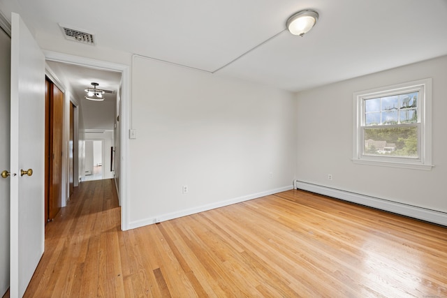81 Summit St, Southington, CT 06489 - empty room with attic access, a baseboard radiator, light wood-style floors, and baseboards