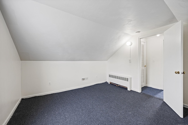 81 Summit St, Southington, CT 06489 - bonus room featuring radiator, lofted ceiling, baseboards, and dark colored carpet