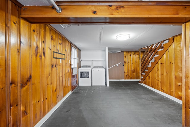 81 Summit St, Southington, CT 06489 - below grade area with washing machine and dryer, wood walls, baseboards, and stairs