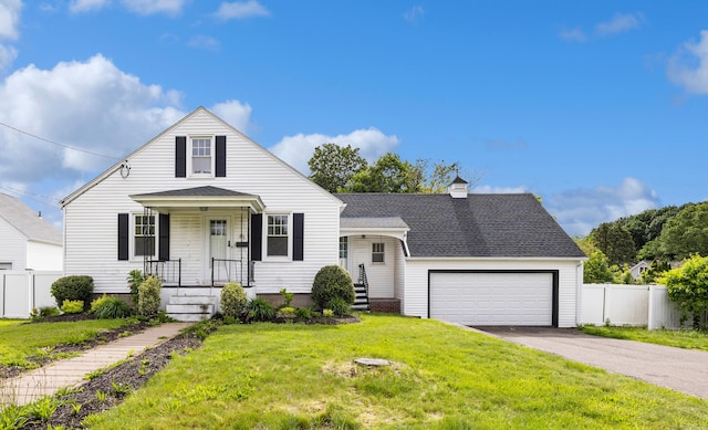 81 Summit St, Southington, CT 06489 - view of front of house with asphalt driveway, a garage, roof with shingles, and covered porch