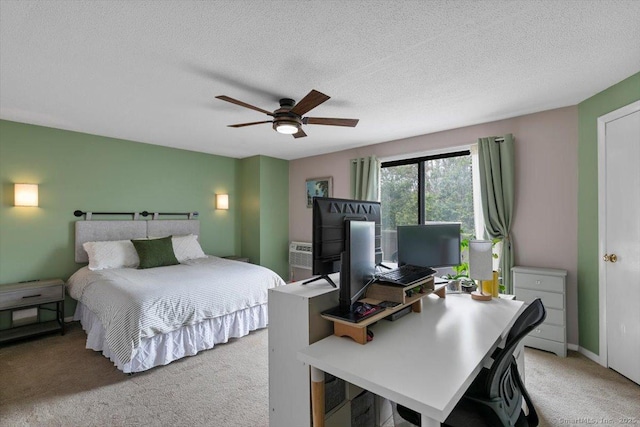 44 Mohawk Trl Unit 44, Guilford, CT 06437 - bedroom featuring carpet, a textured ceiling, and ceiling fan