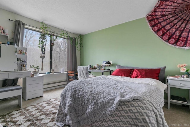 44 Mohawk Trl Unit 44, Guilford, CT 06437 - bedroom with vaulted ceiling, a textured ceiling, carpet floors, and baseboard heating