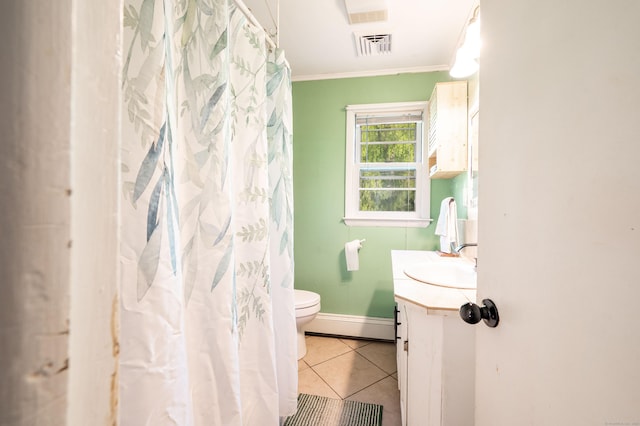 bathroom featuring a baseboard heating unit, tile patterned floors, toilet, vanity, and crown molding