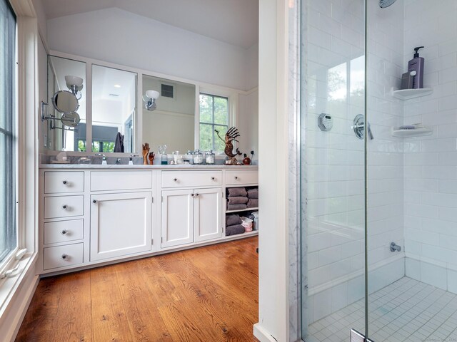 39 Painter Hill Rd, Woodbury, CT 06798 - full bath with a stall shower, wood finished floors, vanity, and lofted ceiling