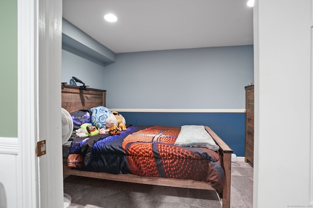 carpeted bedroom with recessed lighting