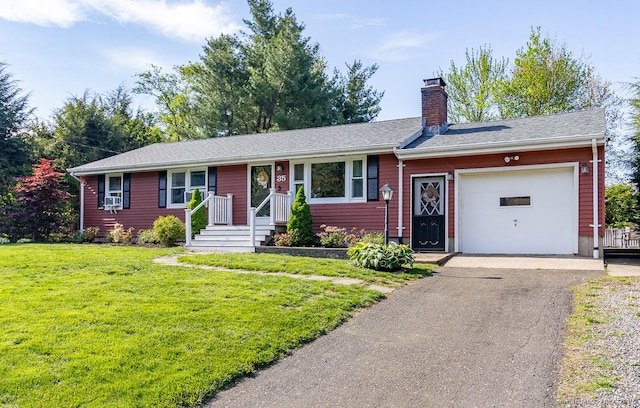 ranch-style house featuring a garage, a front lawn, asphalt driveway, a chimney, and cooling unit