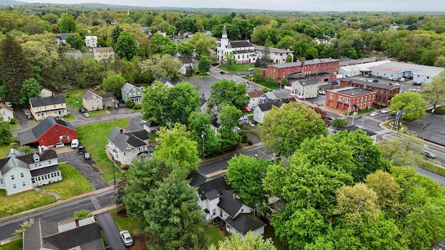 bird's eye view with a forest view and a residential view