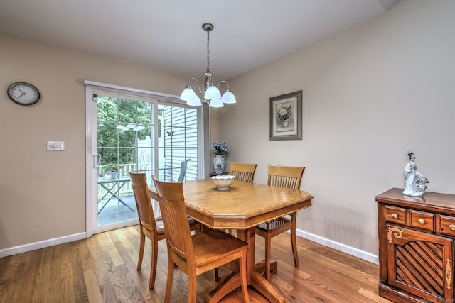 30 Prosperity Ct Unit 25, Southington, CT 06489 - dining area featuring a chandelier, baseboards, and light wood finished floors