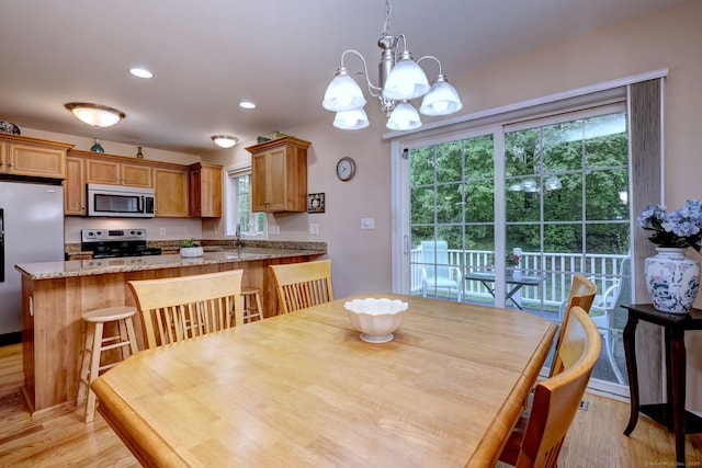 30 Prosperity Ct Unit 25, Southington, CT 06489 - dining room featuring light wood-type flooring, a chandelier, and recessed lighting